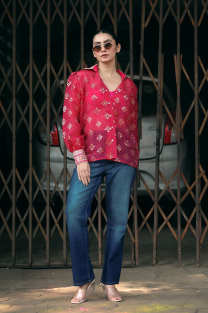 Black drip district shirt by 66aura featuring a stylish graphic print and casual fit, displayed on a hanger.