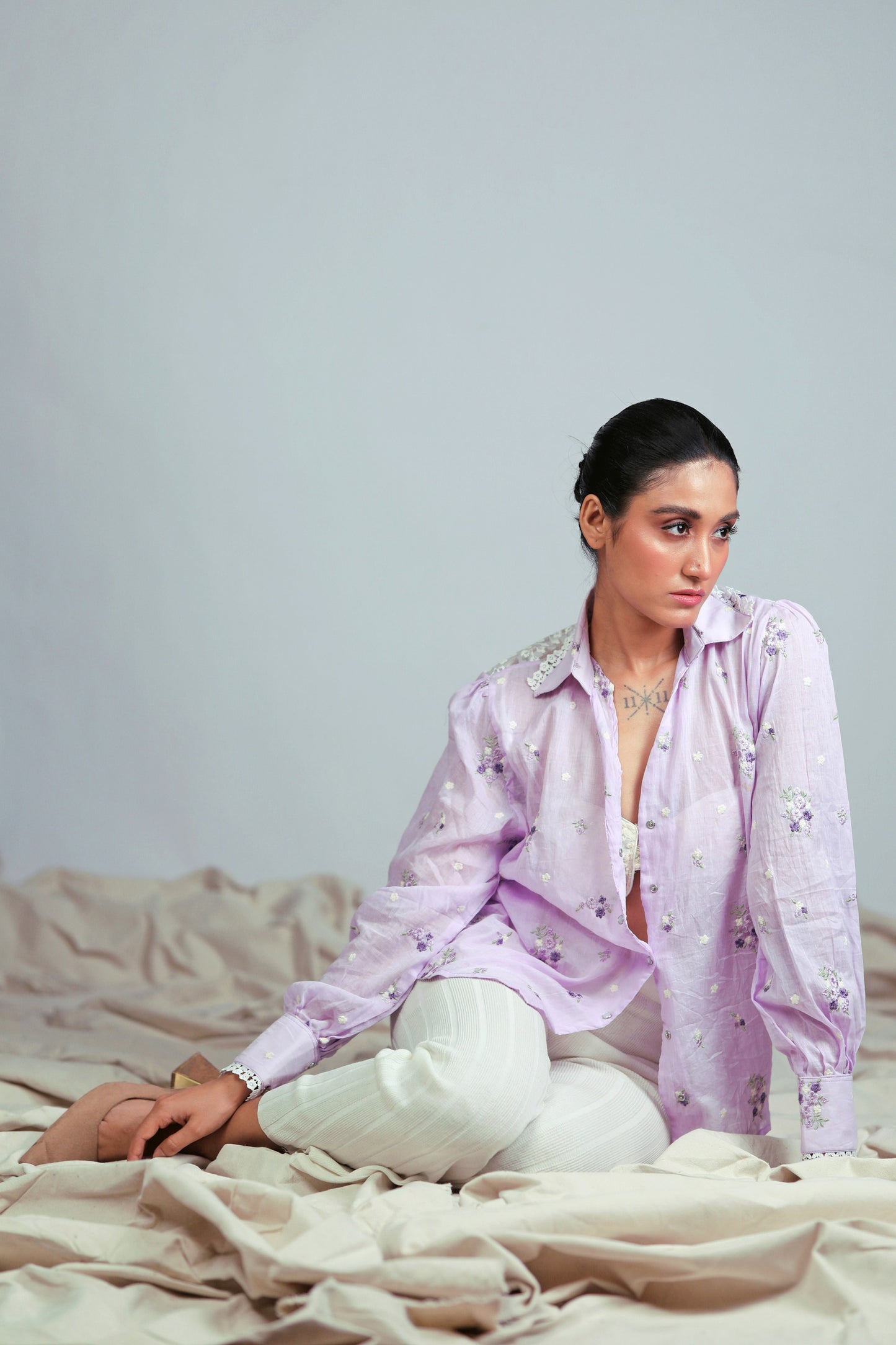 Lilac Lagoon oversized shirt by 66aura, featuring a relaxed fit and soft fabric, displayed on a hanger against a white background.