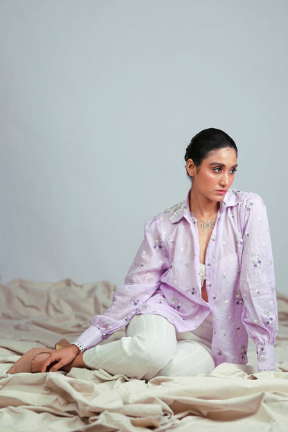 Lilac Lagoon oversized shirt by 66aura, featuring a relaxed fit and soft fabric, displayed on a hanger against a white background.