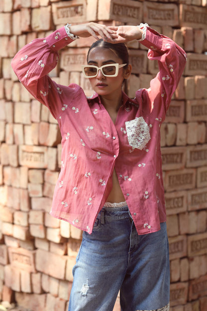 Soft cotton candy-colored shirt by 66aura, featuring a casual fit and smooth cotton fabric, displayed on a hanger.