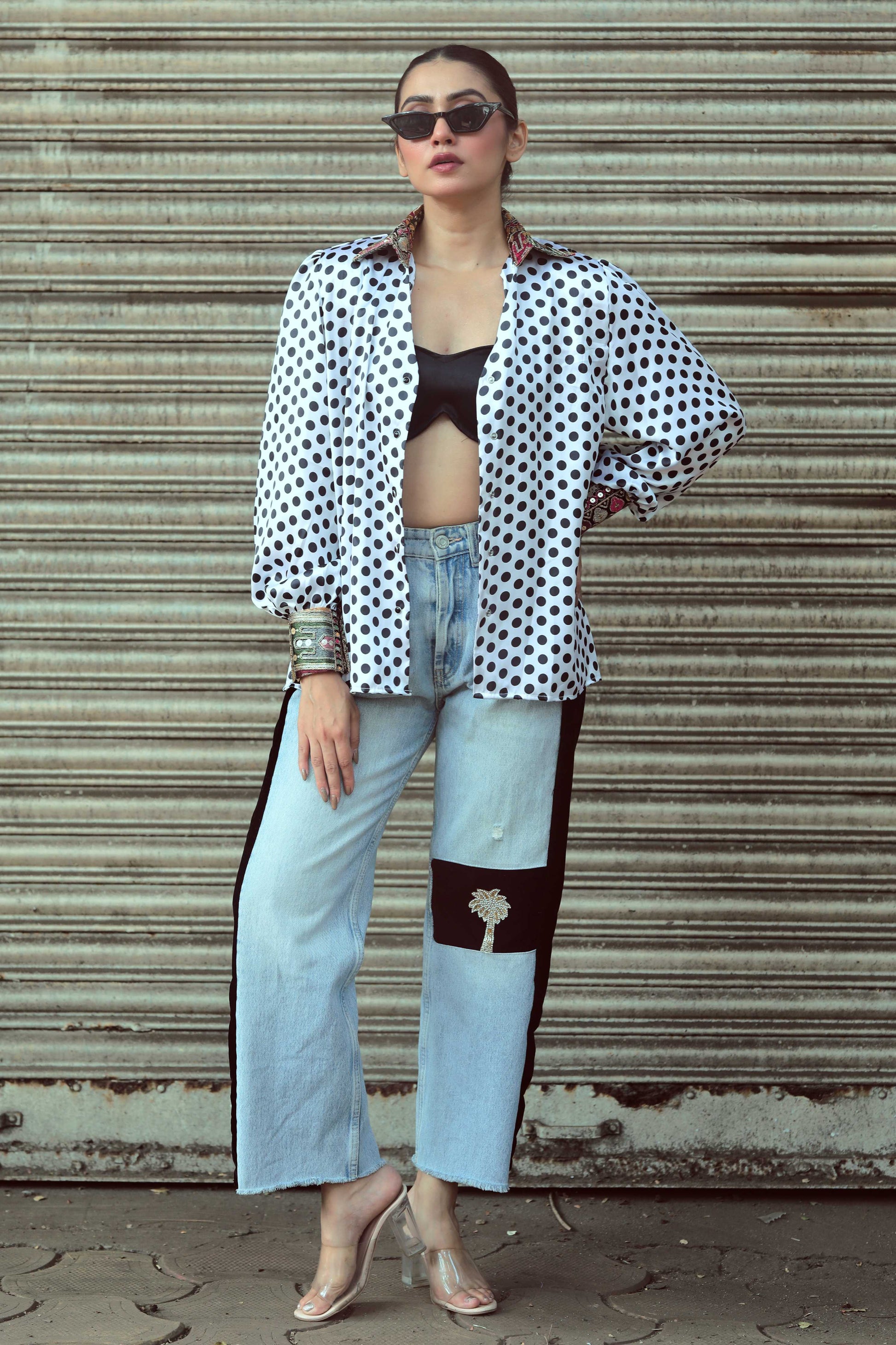 Black Plot Twist shirt by 66aura featuring a bold graphic design on the front, casual fit, and soft cotton fabric.