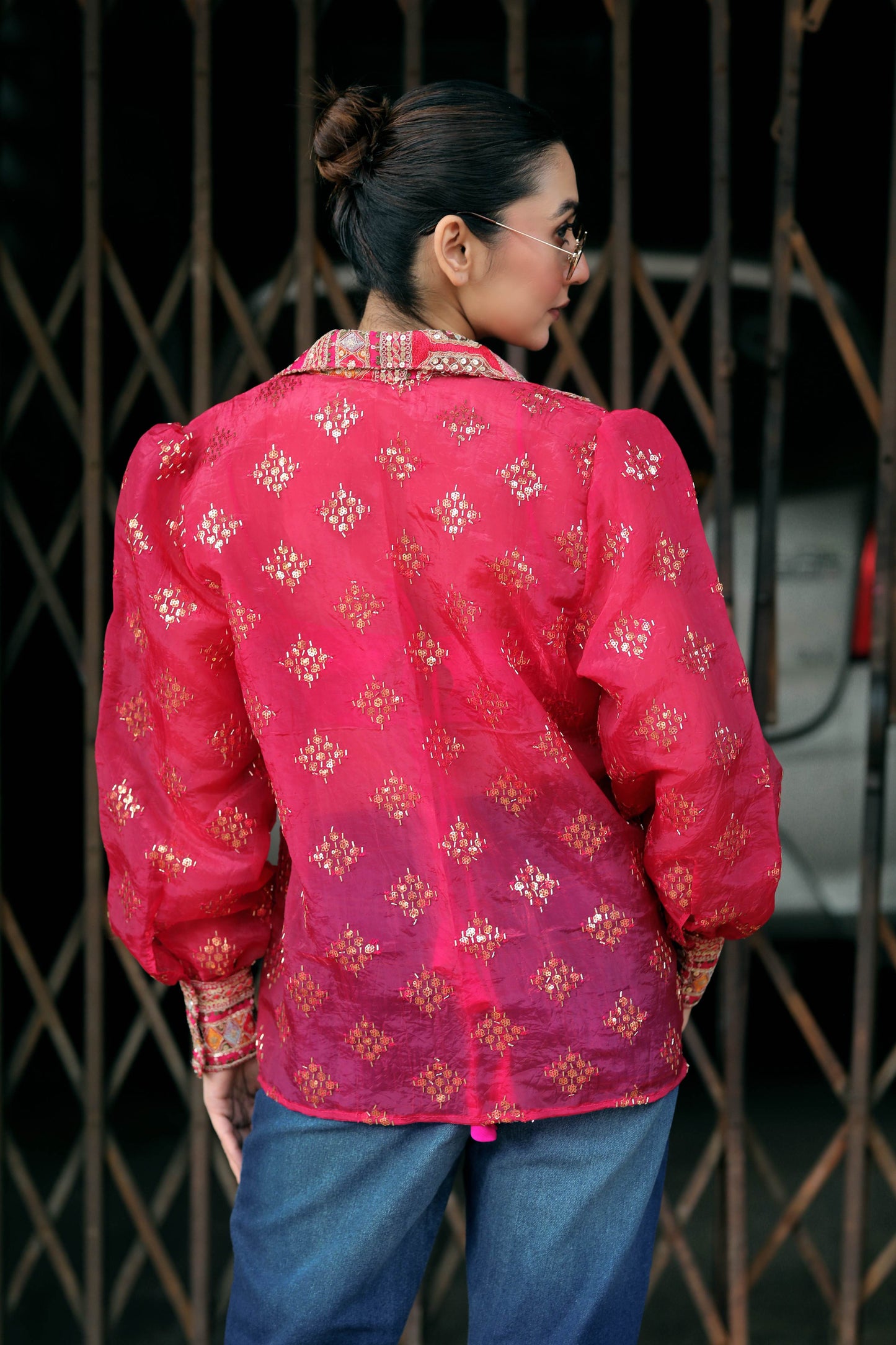 Black drip district shirt by 66aura featuring a stylish graphic design on the front and a comfortable fit.