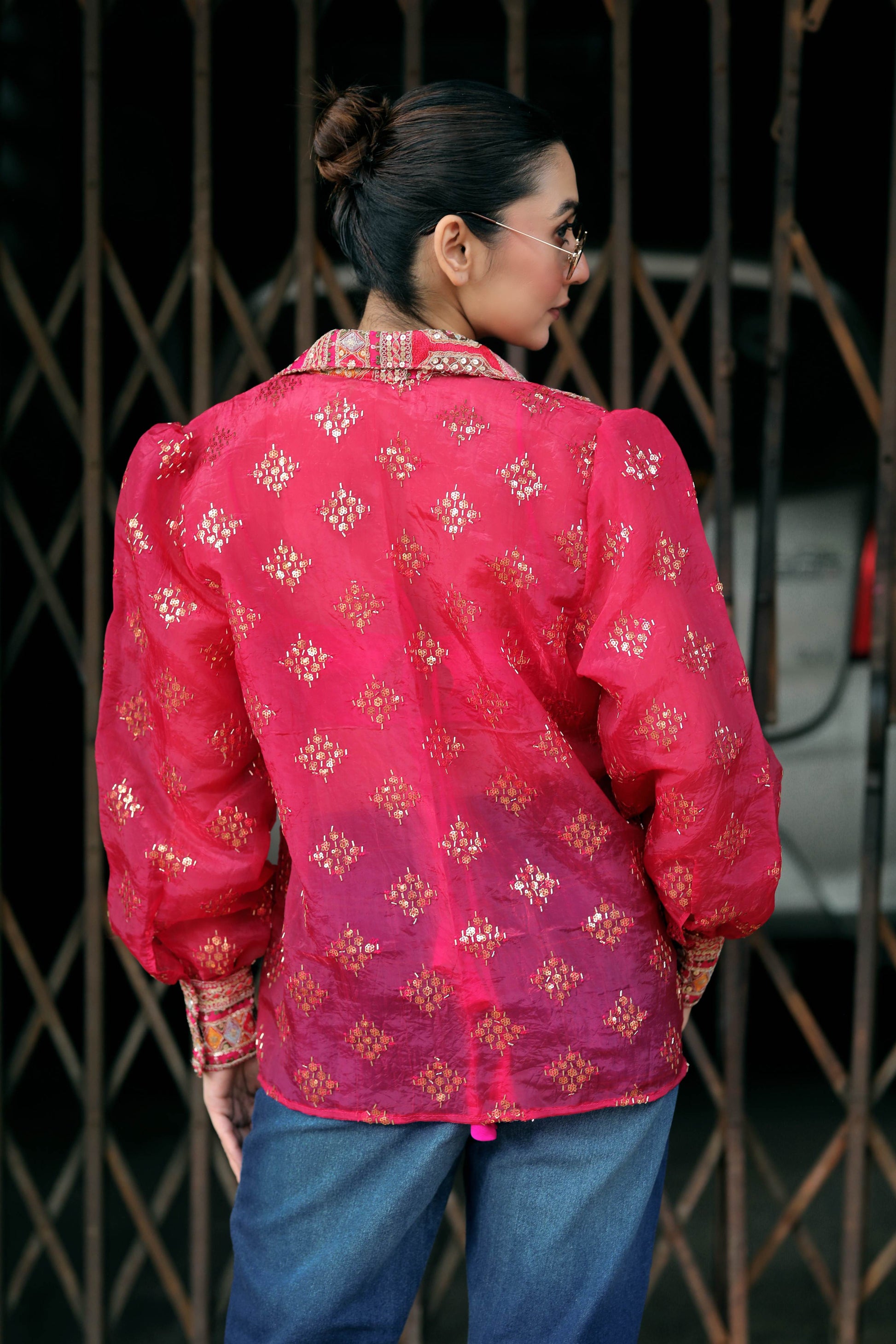 Black drip district shirt by 66aura featuring a stylish graphic design on the front and a comfortable fit.