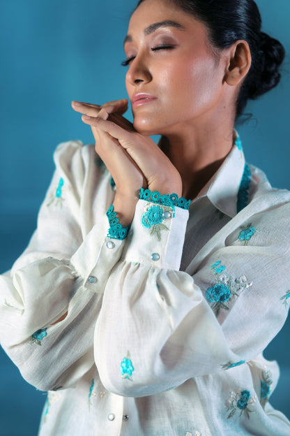 Oversized Chill Charm shirt by 66aura in soft fabric, featuring a relaxed fit with stylish details and casual design.