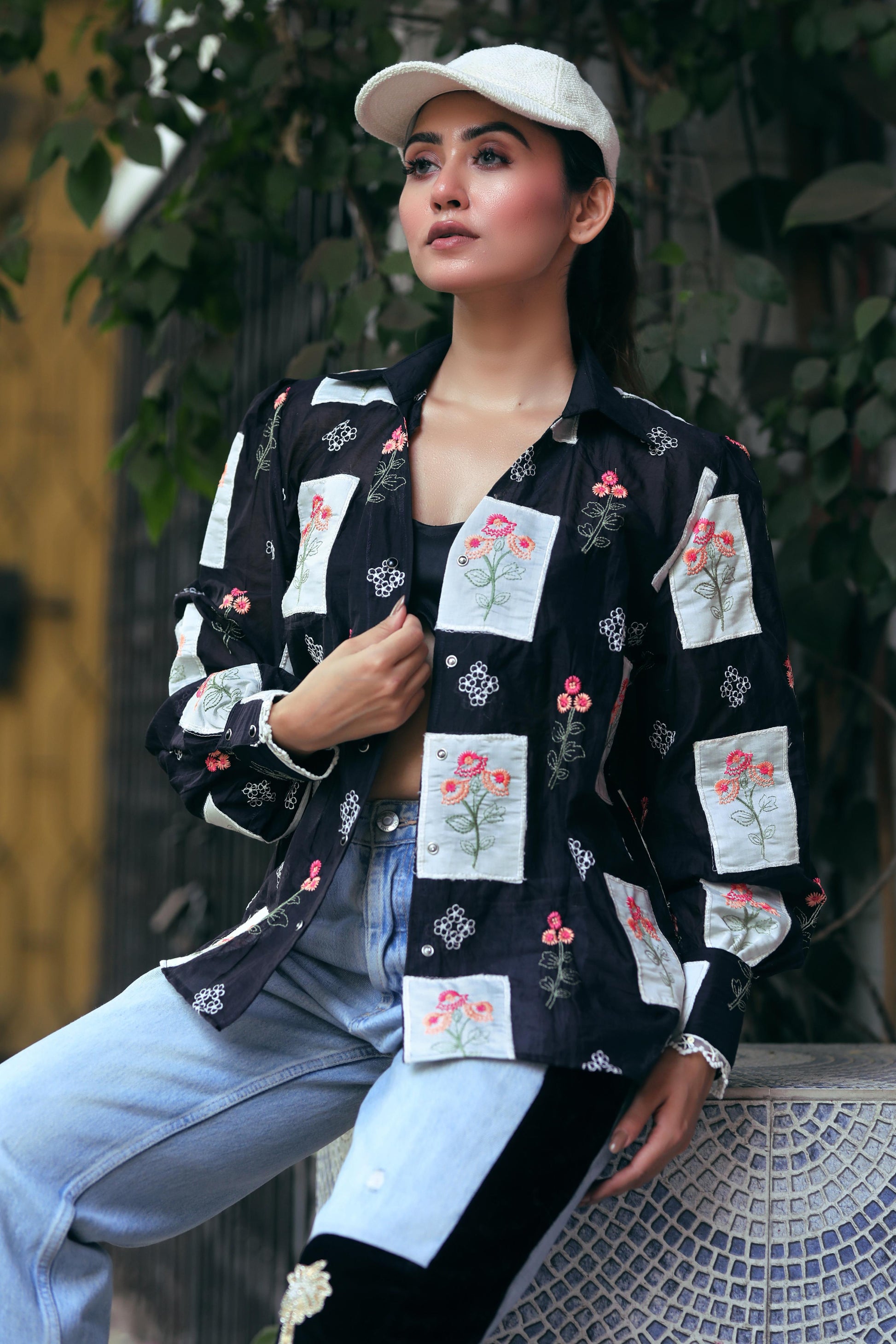 66aura VIBE CHECK shirt featuring a stylish casual design with a relaxed fit and vibrant pattern.