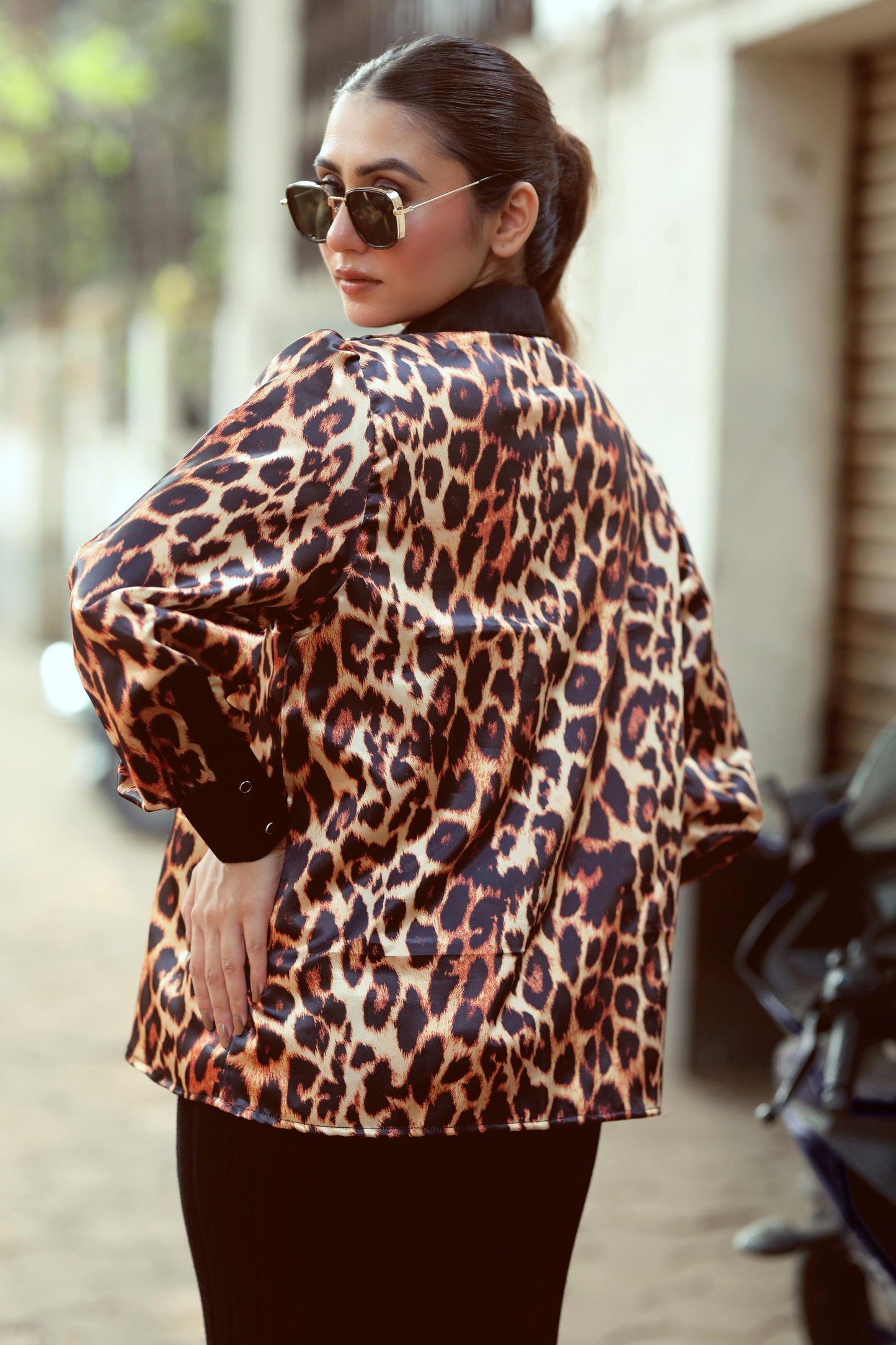 Black BOSS MOVE shirt by 66aura, featuring a classic collar and button-up front, displayed on a hanger.