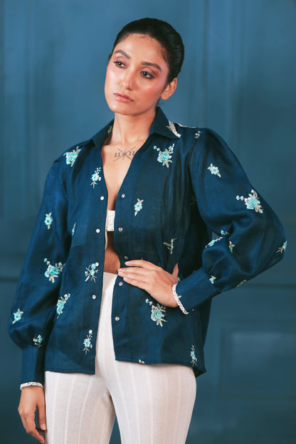 Navy Nexus oversized shirt by 66aura displayed on a hanger with a relaxed fit and button-front design.