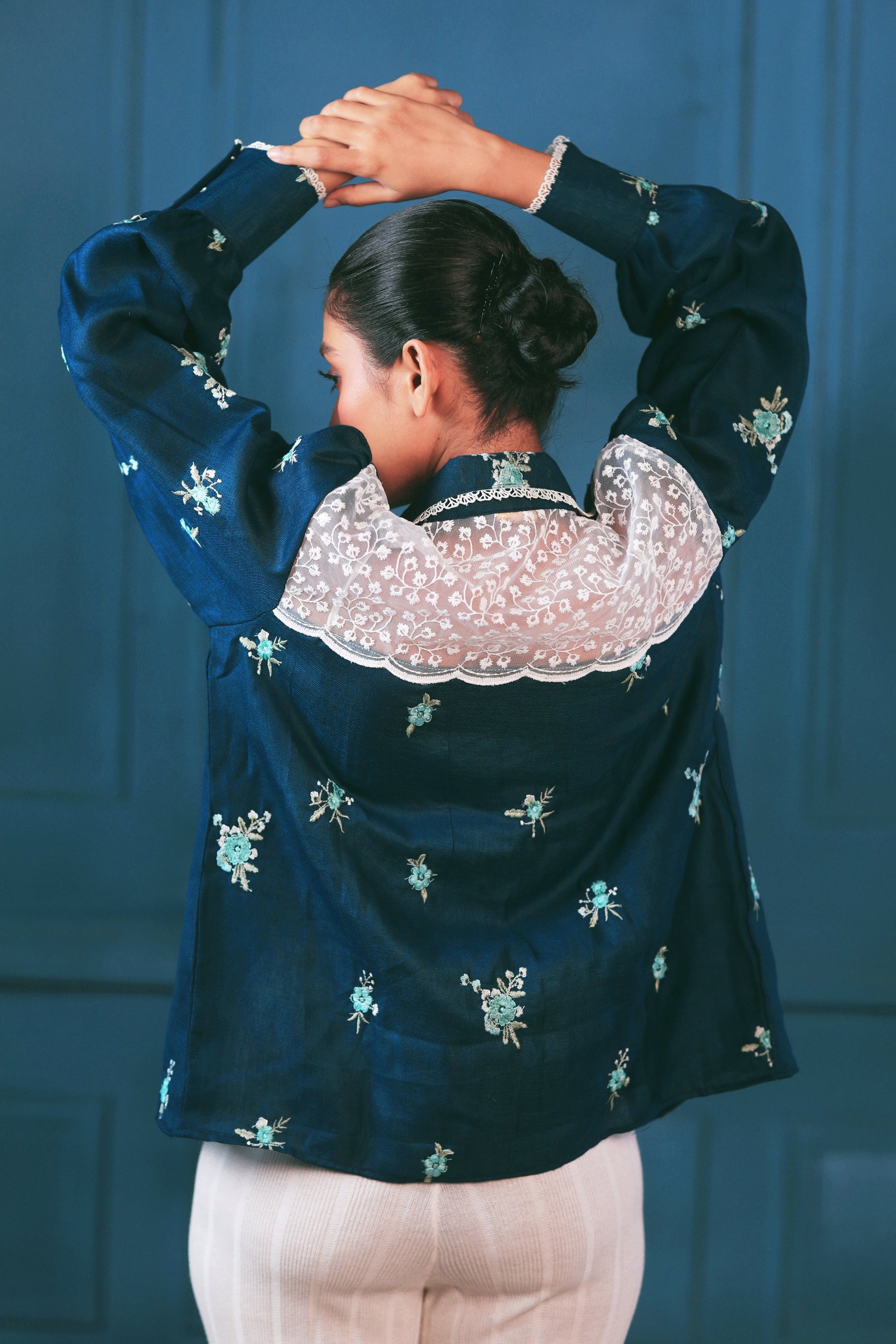 Navy Nexus oversized shirt by 66aura displayed flat, showcasing its relaxed fit, soft fabric, and minimalist design.