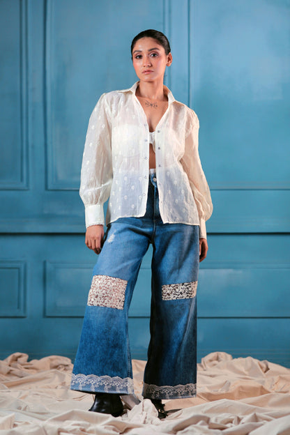 Oversized cloud craft shirt by 66aura displayed on a hanger, featuring soft fabric and relaxed fit in neutral tones.
