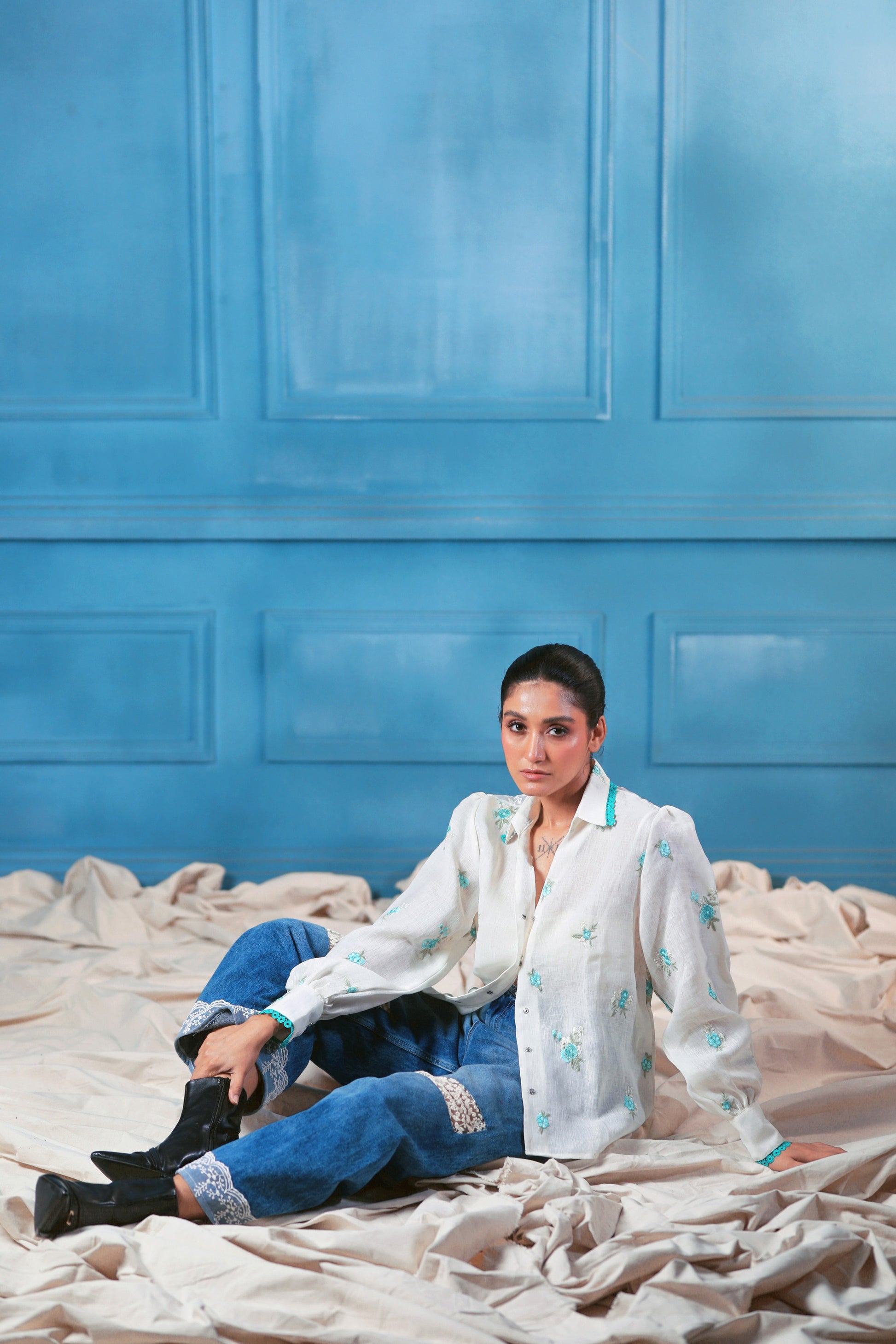 Oversized Chill Charm shirt by 66aura in soft fabric, featuring a relaxed fit and stylish design, displayed on a hanger.