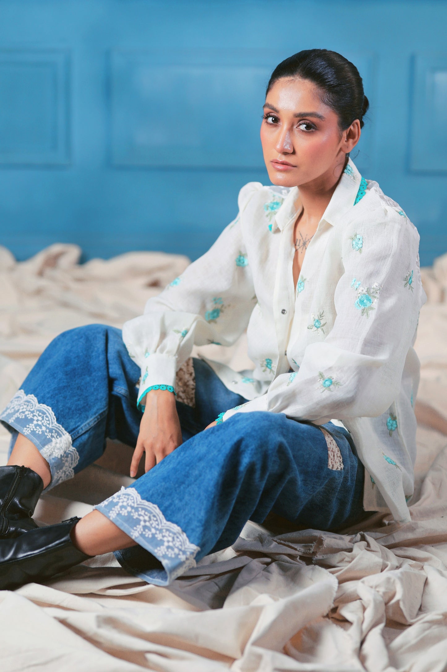 Oversized Chill Charm shirt by 66aura featuring a relaxed fit with a stylish design, shown on a hanger.