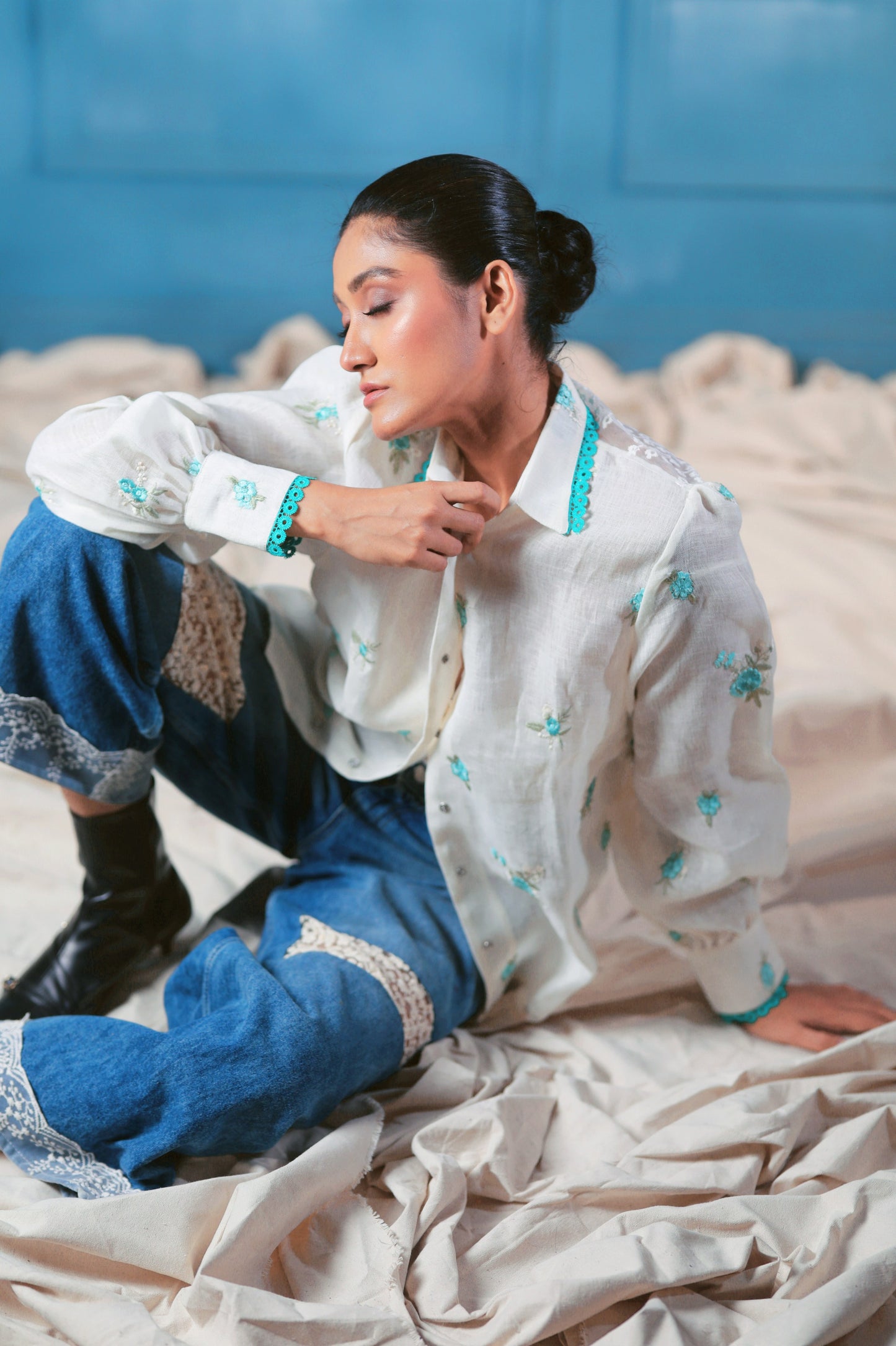 Oversized Chill Charm shirt by 66aura, featuring a relaxed fit with soft fabric and stylish design, displayed on a hanger.