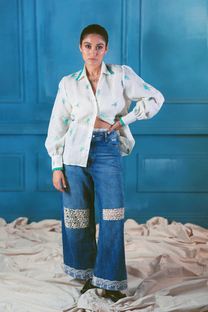 Oversized Chill Charm shirt by 66aura in soft fabric, featuring a relaxed fit and stylish design, displayed on a hanger.