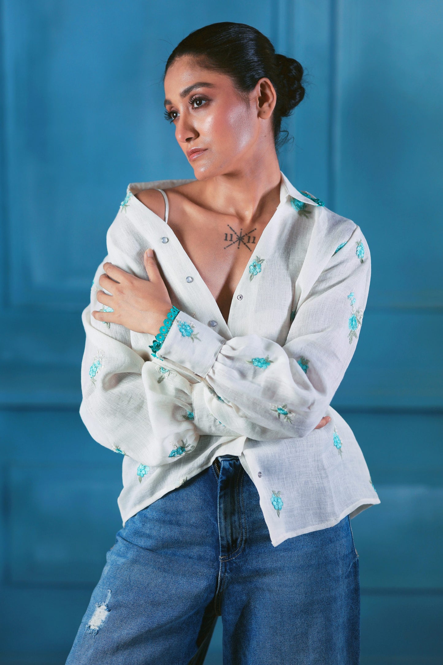Oversized CHILL CHARM shirt by 66aura featuring a relaxed fit and soft fabric, shown in a natural pose.