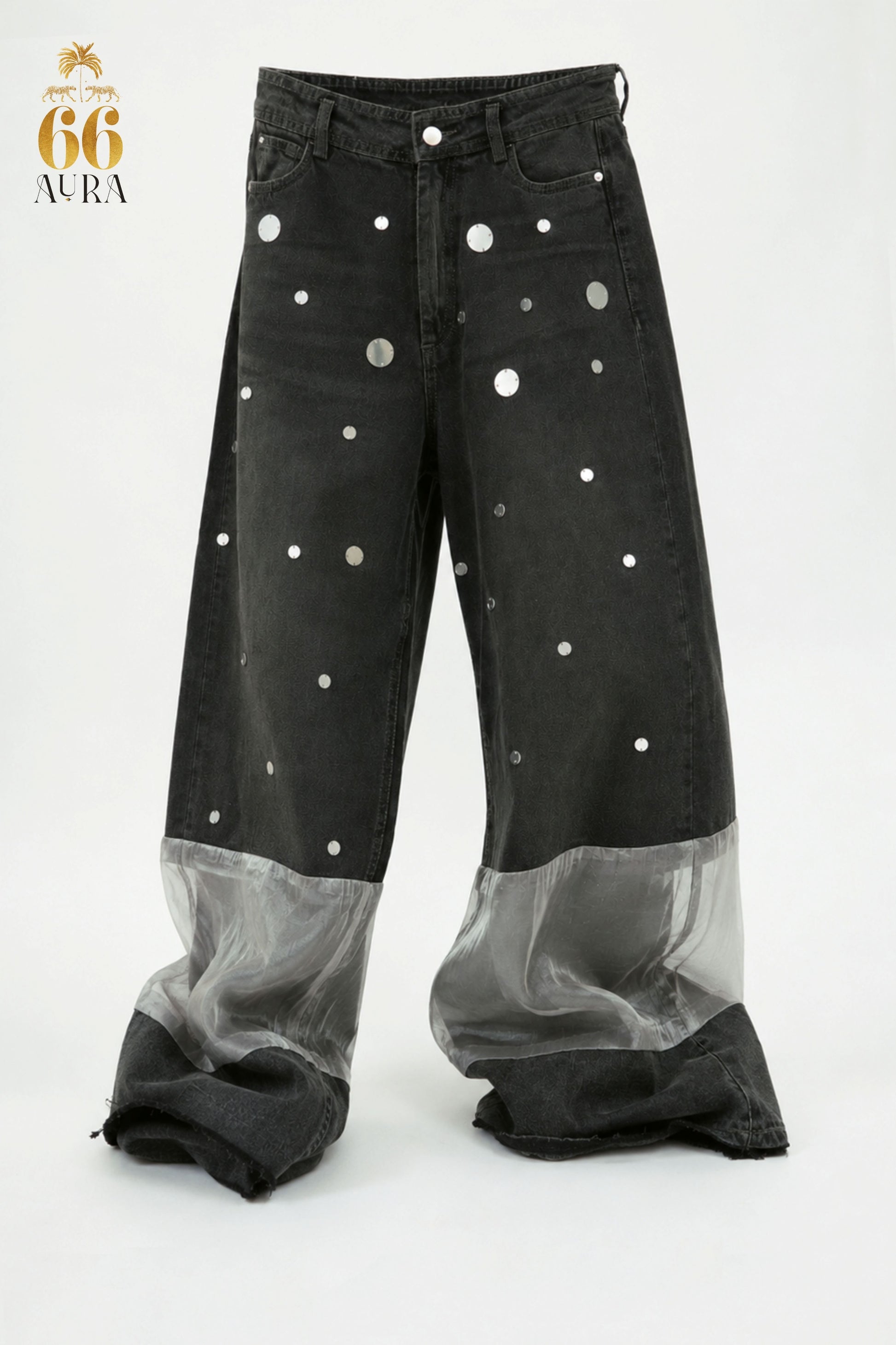 Model wearing 66aura Heart Breaker jeans, showcasing stylish denim with a relaxed fit on a patterned carpet background.