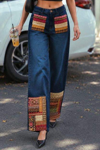 Slim fit Too Iconic jeans by 66aura in dark denim with five pockets and stylish stitching, displayed on a hanger.