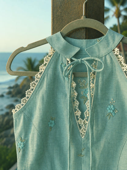 Mint green Tuscany Tide top by 66aura featuring a relaxed fit and stylish design, shown on a hanger.