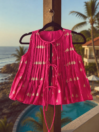 Pink Bellagio Babe Top by 66aura featuring soft fabric and stylish design, shown on a hanger against a neutral background.