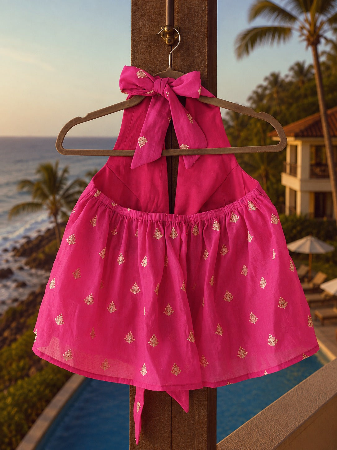 Pink chicken hang-up display featuring the Cupid Crisis Top by 66aura, showcasing the vibrant pink fabric and stylish design.