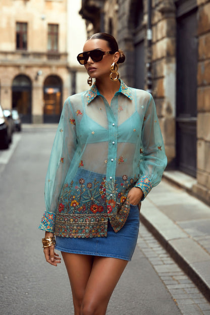 Sky blue oversized Coastal Carnival shirt by 66aura with a relaxed fit and colorful coastal-inspired print.