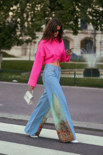 Light blue summer fling jeans by 66aura, featuring a relaxed fit and classic five-pocket design, worn by a model outdoors.